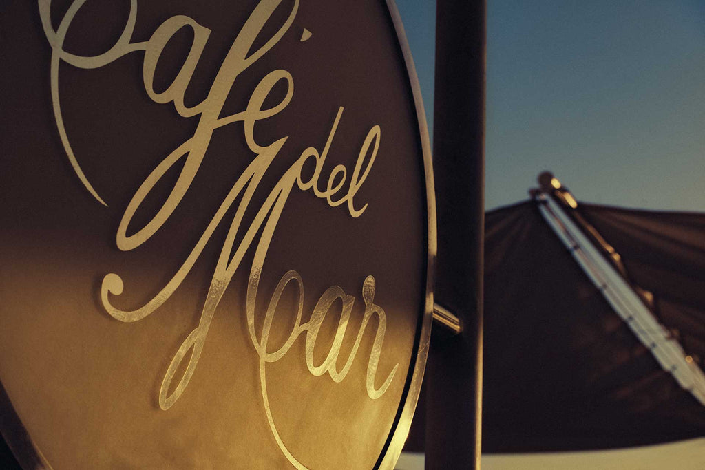 The Café del Mar sign at sunset